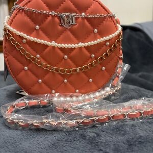 Quilted Orange Crossbody Bag with Chain Detail